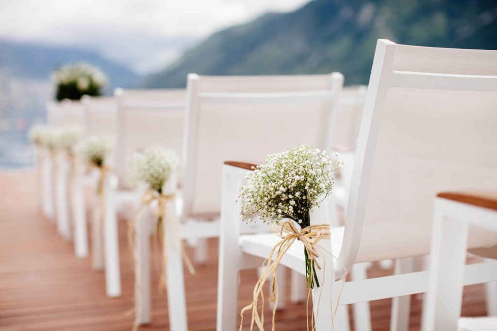 wedding-chairs-with-flowers-decoration-GLF5NX2-1-1024x683